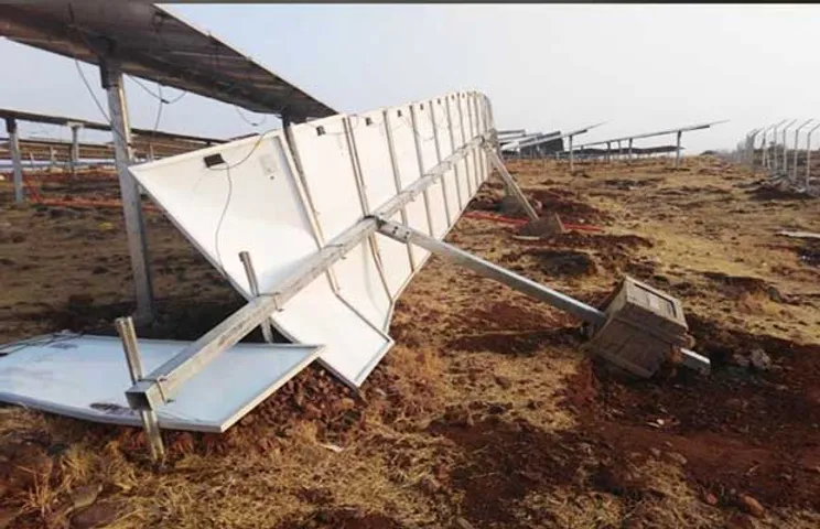 A damaged solar array after a storm