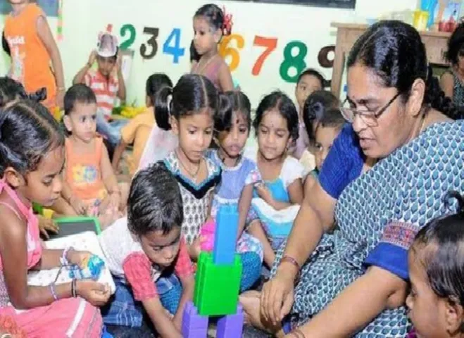 अ