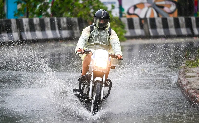 man rides bike