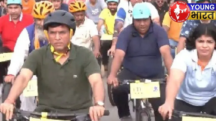 Mansookh Mandviya and Sakshi Malik