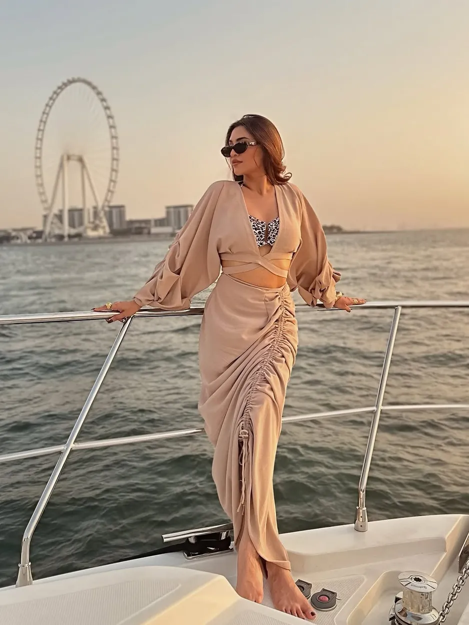 Golden hour hits different at sea 🌅...Wearing @label_bella_d 🤎🛥️ @skywalkeryachts @visit.duba
