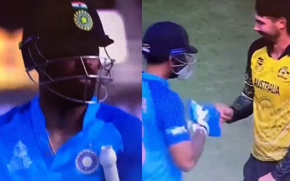 Suryakumar Yadav shares fist bump with Kane Richardson