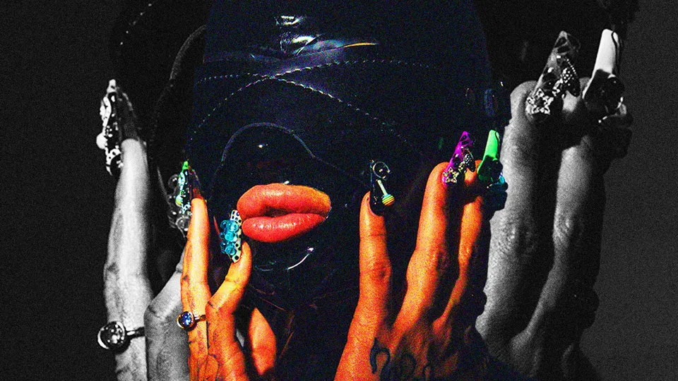 An image of two pairs of hands with rings and colourful nail art around a blackened out face representing the diversity when it comes to Kink in India and BDSM India,  in light of the fact that in 2025, there's a more sex-positive India that's talking about dating and kink which is inspiring consent culture India