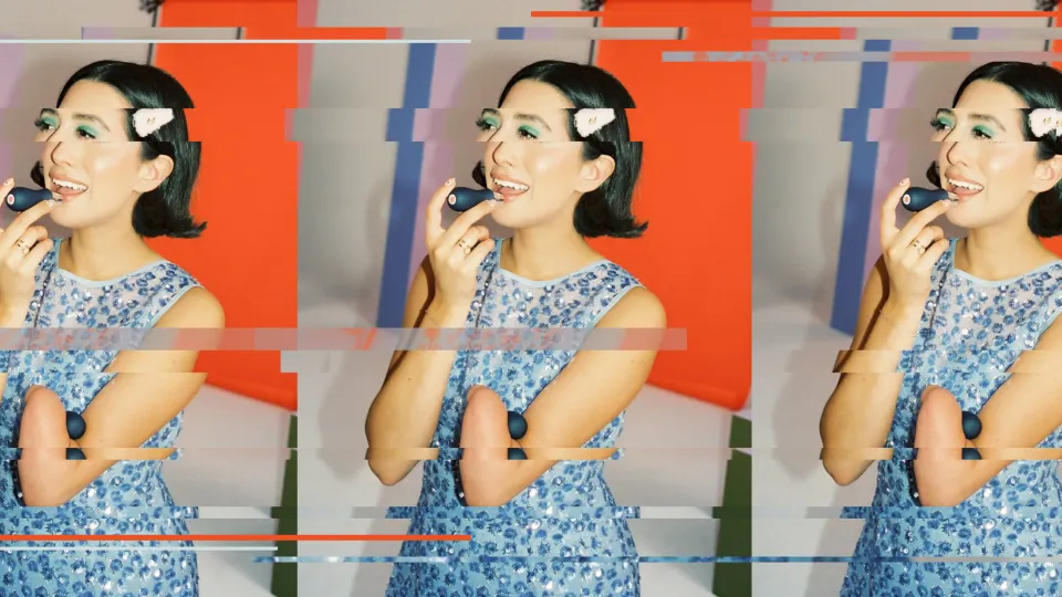 Disabled content creator April Lockhart applying a make-up product that is accessible and an adaptive beauty tool