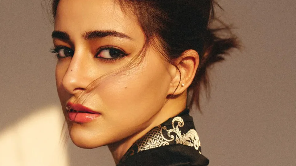Close-up portrait of Ananya Panday, capturing her poised and introspective side in a soft golden light for The Established