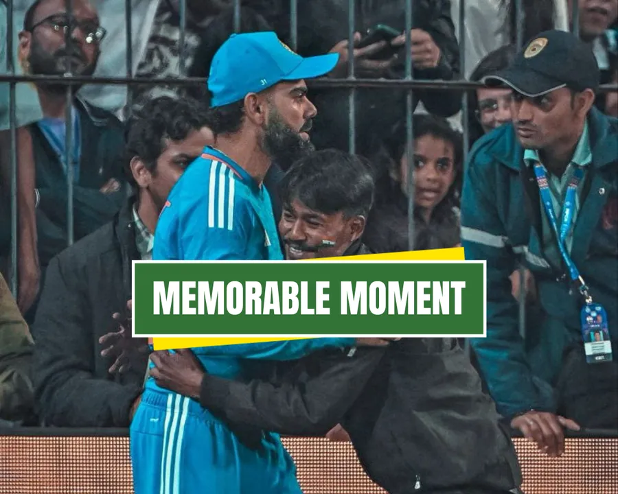 Fan hugs Virat Kohli