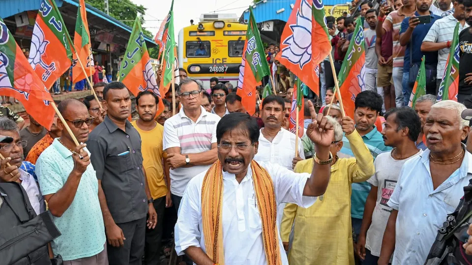 BJP MP Jagannath Sarkar along with party workers block railway tracks at Shantipur station during the party's 12-hour general strike in Bengal to protest the police action against participants of Tuesday's Nabanna Abhijan rally which was held against the Kolkata RG Kar incident, in Nadia, Wednesday, Aug. 28, 2024.
