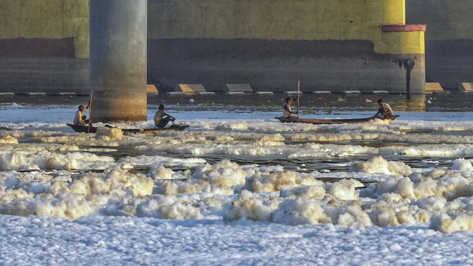 Toxic foam floats on the surface of the polluted Yamuna river, at Kalindi Kunj, in New Delhi, Friday, Oct. 18, 2024.
