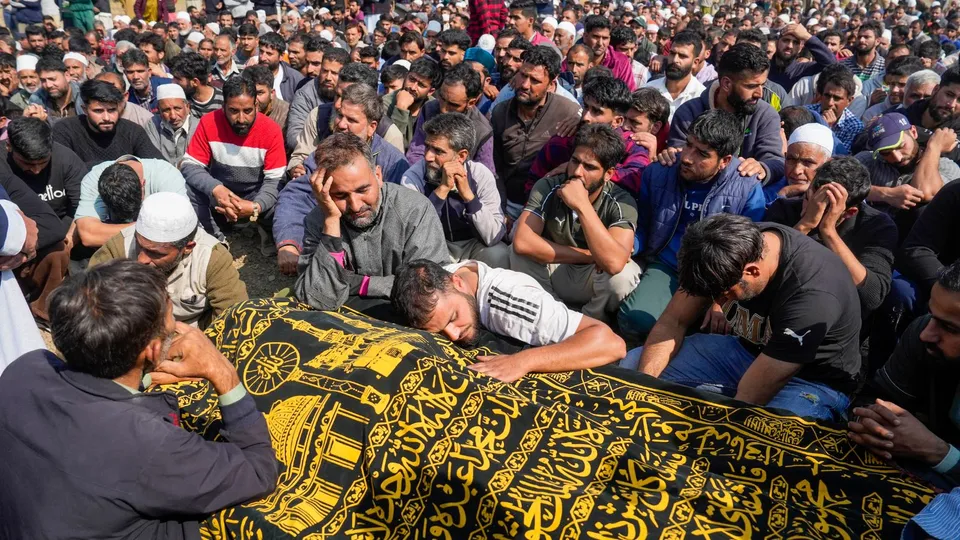 Relatives and locals during the funeral of doctor Shahnawaz, who was killed in a terrorist attack in J&K's Ganderbal on Sunday, at Naidgam in Budgam district, Jammu & Kashmir, Monday, Oct. 21, 2024.