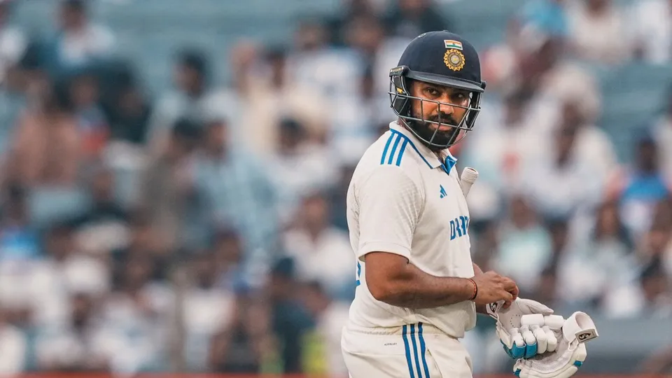 Rohit Sharma walks back after his dismissal