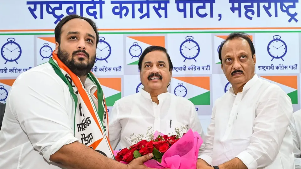 Maharashtra Deputy Chief Minister and NCP (Ajit) chief Ajit Pawar felicitates Zeeshan Siddique as the latter joins the party and will contest from the Bandra East constituency in the upcoming Maharashtra Assembly elections, in Mumbai, Friday, Oct. 25, 2024.