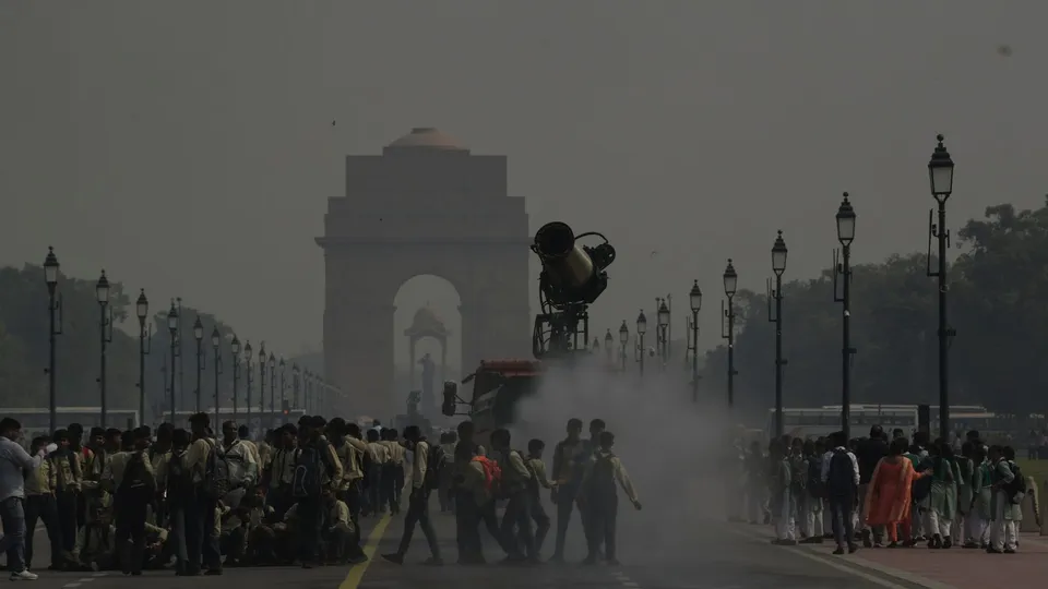 An anti-smog gun being used at the Kartavya Path to curb air pollution, near the India Gate, in New Delhi