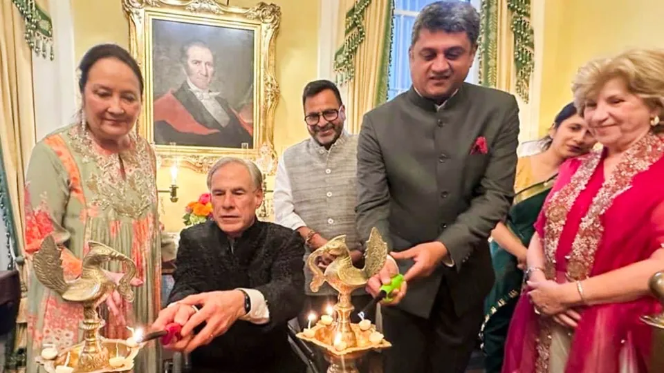 Consul General of India in Houston D.C. Manjunath with Governor of Texas Greg Abbott during Diwali festival celebrations, in Austin, USA, Sunday, Nov. 3, 2024.