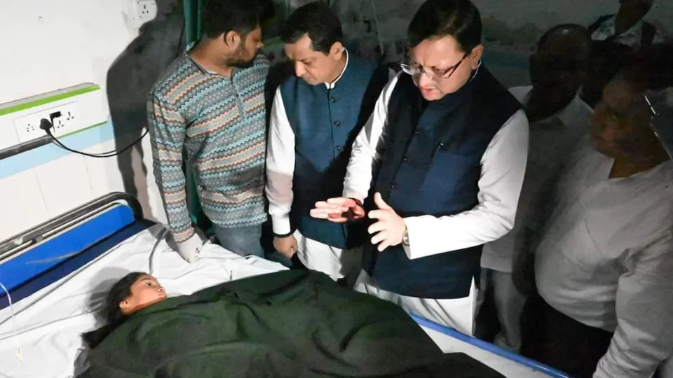 Uttarakhand Chief Minister Pushkar Singh Dhami meets injured being treated at a hospital, in Ramnagar, Monday, Nov. 4, 2024.
