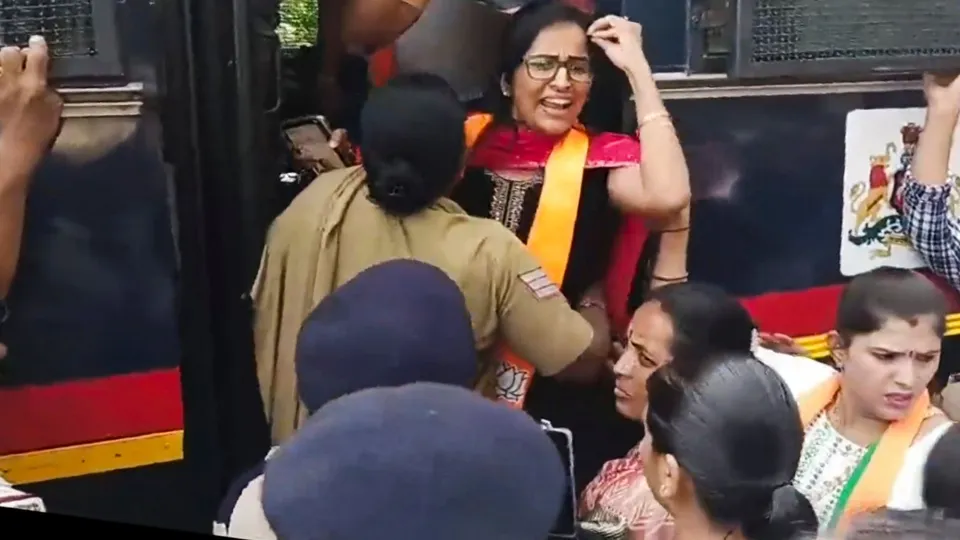 BJP workers being detained by police personnel during their protest against Karnataka Chief Minister Siddaramaiah, in Mysuru, Wednesday, Nov. 6, 2024.