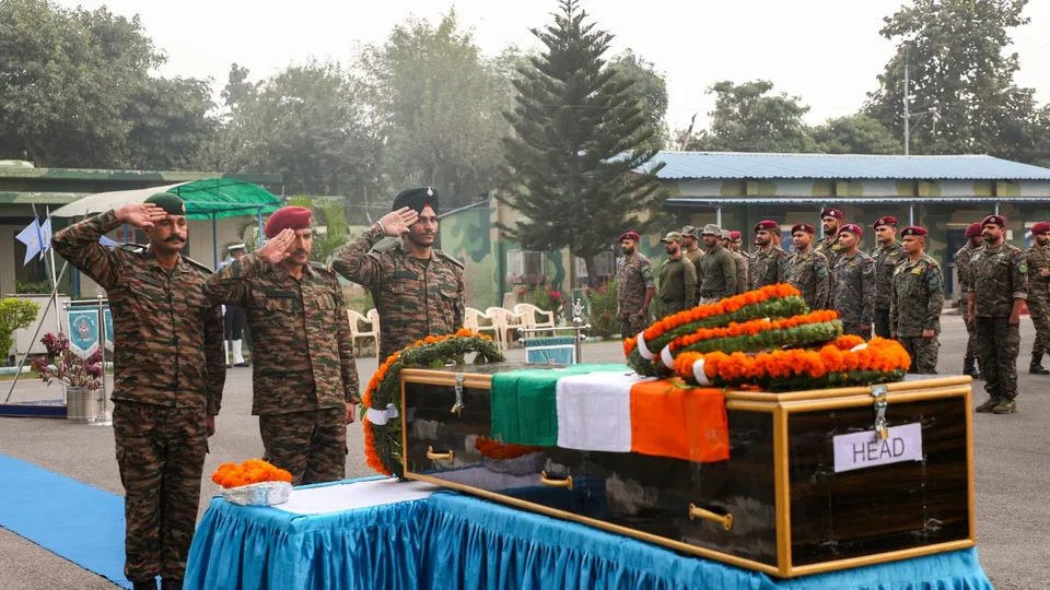 Army jawans pays his last respects to Naib Subedar Rakesh Kumar, during a ceremony in Jammu, Monday, Nov. 11, 2024.