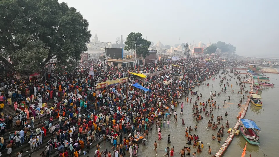 Devotees take a holy dip in the Saryu river, in Ayodhya, Sunday, Nov. 10, 2024.