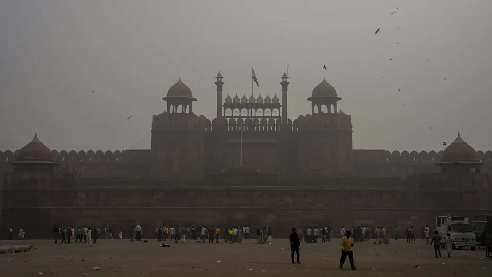 Visitors at the Red Fort amid fog, in New Delhi, Wednesday, Nov. 13, 2024.