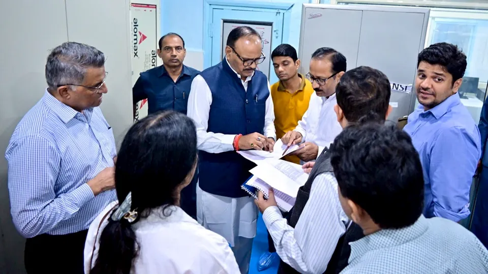 Uttar Pradesh Deputy Chief Minister Brajesh Pathak interacts with officials during an inspection after a fire broke out inside the Neonatal Intensive Care Unit (NICU) of the Maharani Laxmi Bai Medical College, in Jhansi district.