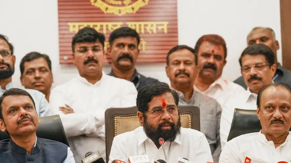 Maharashtra Chief Minister Eknath Shinde with Deputy Chief Ministers Devendra Fadnavis and Ajit Pawar addresses a press conference, in Mumbai, Saturday, Nov. 23, 2024.