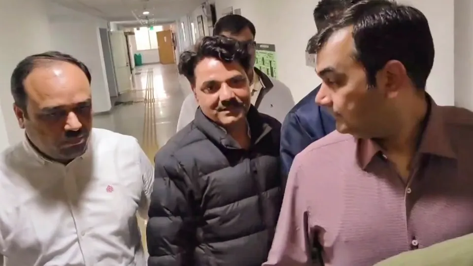 AAP MLA Naresh Balyan (center) being produced in the Rouse Avenue Court, in New Delhi, Tuesday, Dec. 3, 2024.