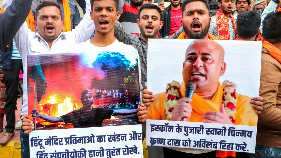 Vishwa Hindu Parishad (VHP) workers raise slogans during a protest against the arrest of Hindu spiritual leader Chinmoy Krishna Das in Bangladesh