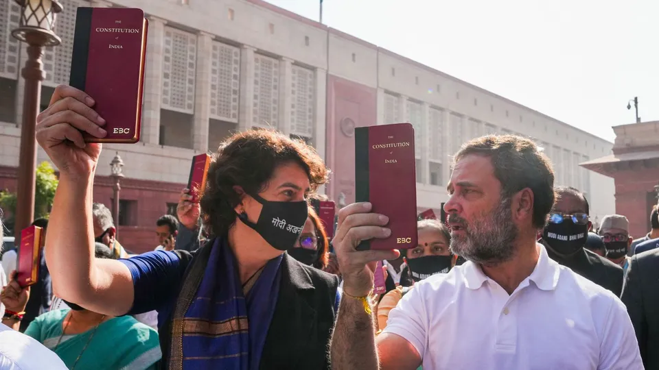 Leader of Opposition in the Lok Sabha Rahul Gandhi and Congress MP Priyanka Gandhi take part in a protest march of opposition MPs over Adani issue during the Winter session of Parliament, in New Delhi, Friday, Dec. 6, 2024.