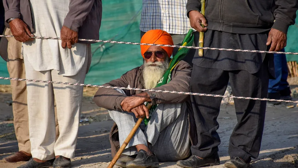 Farmers at the protest site at Shambhu Border before the start of their march towards Delhi, in Patiala district, Sunday, Dec. 8, 2024.