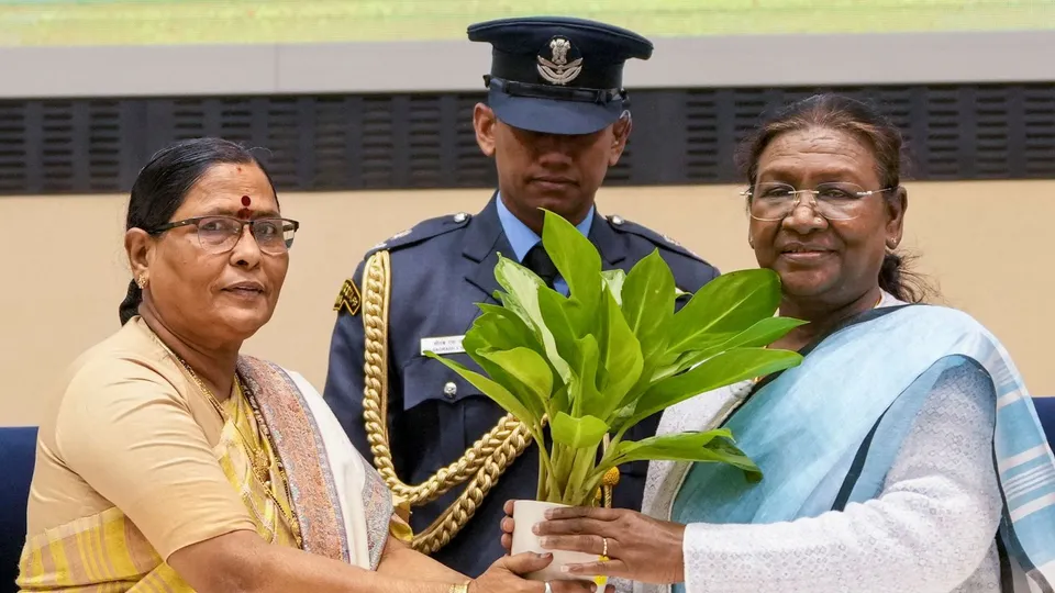 President Droupadi Murmu being presented a sapling by NHRC Acting Chairperson Vijaya Bharathi Sayani during the Human Rights Day 2024 function, in New Delhi, Tuesday, Dec. 10, 2024.