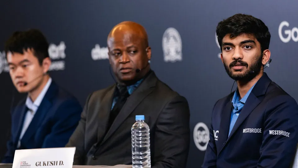 India's Gukesh D. and China's Ding Liren during the press conference after the 12th game of the FIDE World Chess Championship 2024, in Singapore, Monday, Dec. 9, 2024.