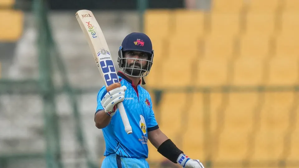 Mumbai's Ajinkya Rahane celebrates his half century during the first semi-final T20 cricket match of the Syed Mushtaq Ali Trophy between Baroda and Mumbai, at the M Chinnaswamy Stadium, in Bengaluru, Friday, Dec. 13, 2024.