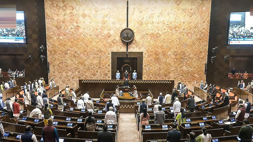 Members in the Rajya Sabha observe a moment of silence to pay tribute to the martyrs of the 2001 Parliament attack during the Winter session of Parliament, in New Delhi, Friday, Dec. 13, 2024.