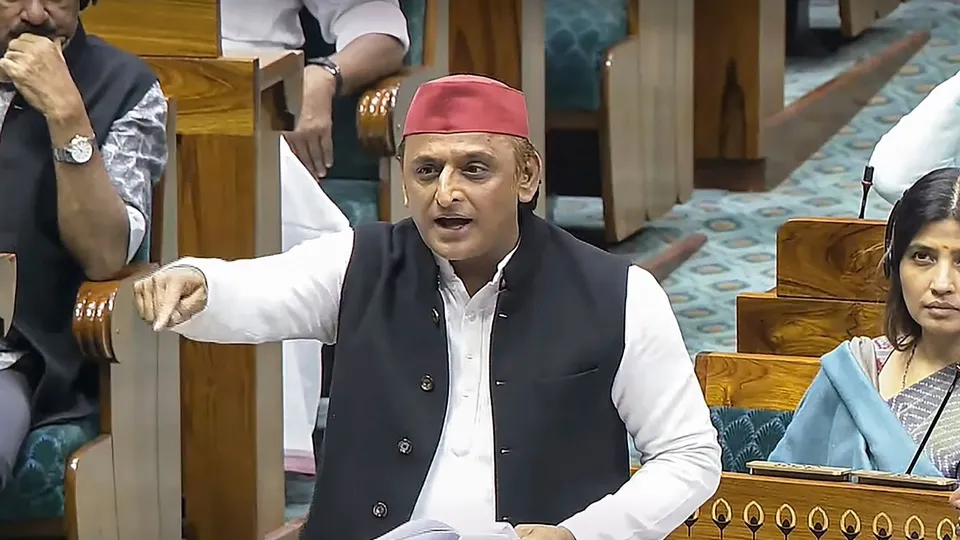 Samajwadi Party MP Akhilesh Yadav speaks in the Lok Sabha during a discussion on 75th anniversary of the adoption of the Indian Constitution at the Winter session of Parliament, in New Delhi, Friday, Dec. 13, 2024.