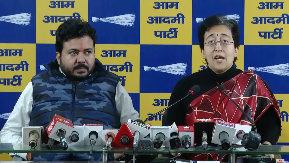 Durgesh Pathak and Atishi