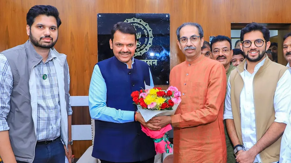 Maharashtra Chief Minister Devendra Fadnavis with Shiv Sena (UBT) chief Uddhav Thackeray, party MLA Aaditya Thackeray and other leaders during a meeting, Tuesday, Dec. 17, 2024.