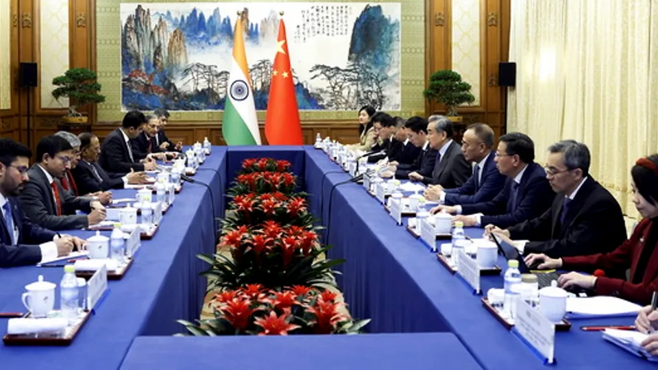 National Security Advisor Ajit Doval with Chinese Foreign Minister Wang Yi and other dignitaries during a meeting, in Beijing, China, Wednesday, Dec. 18, 2024.