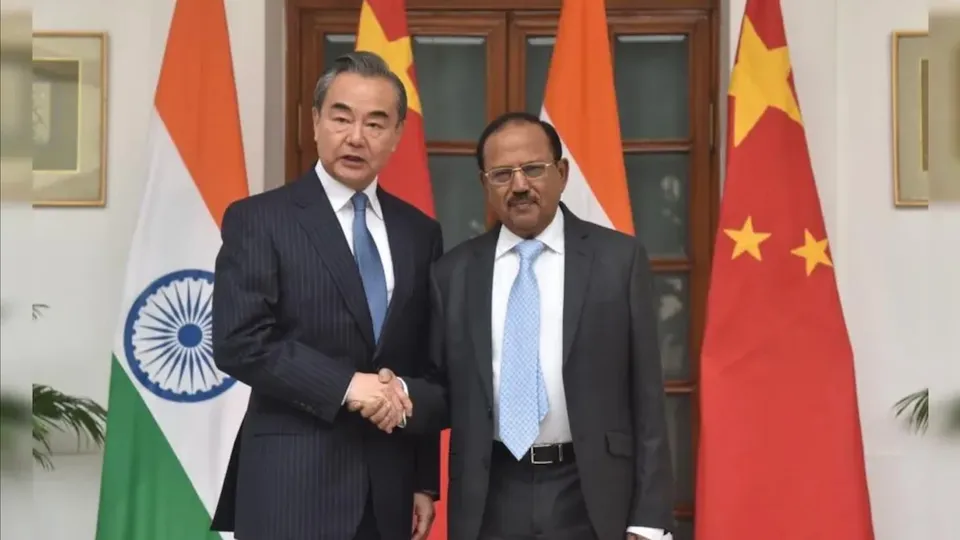Wang Yi and Ajit Doval