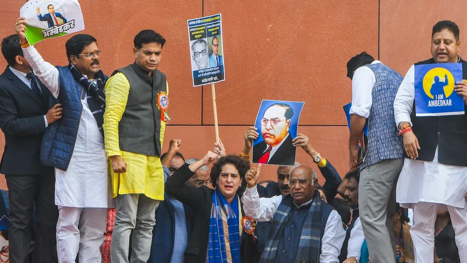 Mallikarjun Kharge with Priyanka Gandhi Vadra and other INDIA bloc members during a protest against Amit Shah for his remarks related to B R Ambedkar at Parliament premises in New Delhi on Thursday, Dec. 19, 2024.
