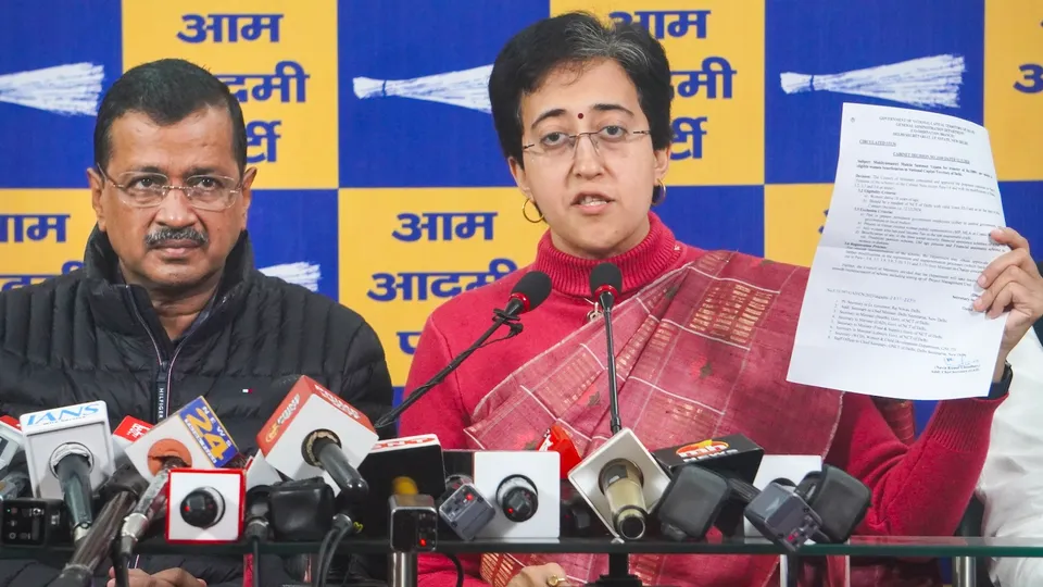Delhi Chief Minister Atishi and AAP National Convenor Arvind Kejriwal during a press conference in New Delhi on Wednesday, Dec. 25, 2024.