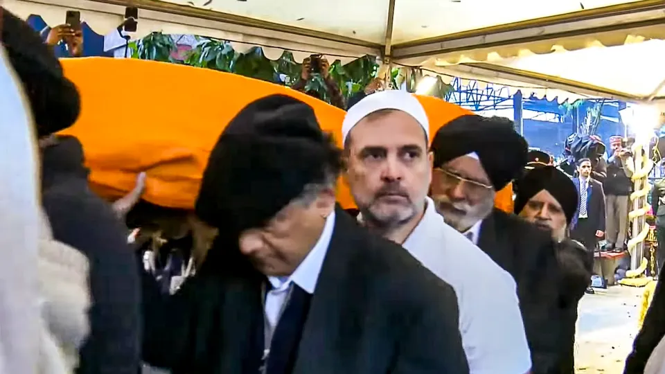 Congress leader Rahul Gandhi carries mortal remains of former prime minister Manmohan Singh during the latter's last rites in New Delhi on Saturday, Dec. 28, 2024. 