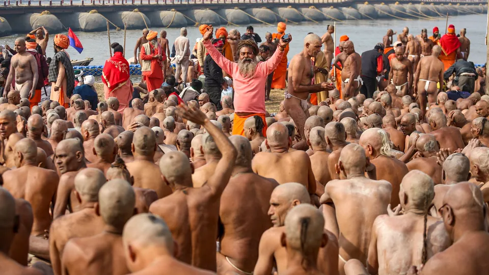 Newly-initiated Naga sadhus of Shri Panch Dashnaam Juna Akhada at the Sangam area during Mahakumbh, in Prayagraj, Saturday, Jan. 18, 2025.