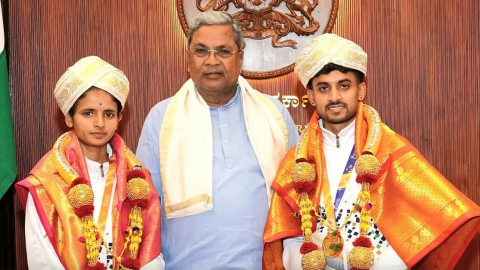 M K Gautham and Chaitra B with Siddaramaiah