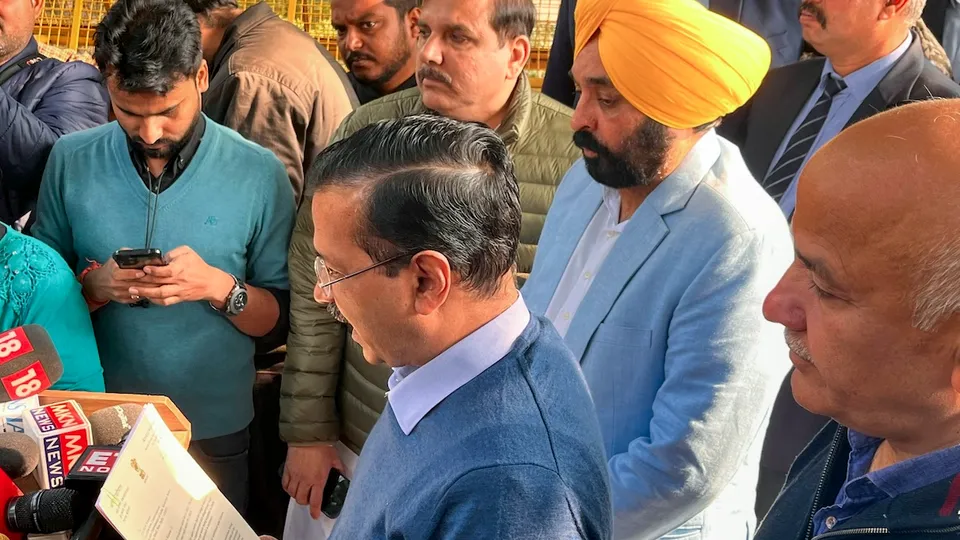 Arvind Kejriwal with Punjab CM Bhagwant Mann and AAP MP Sanjay Singh addresses the media before leaving from his residence to meet Election Commissioners in New Delhi on Friday, Jan. 31, 2025.
