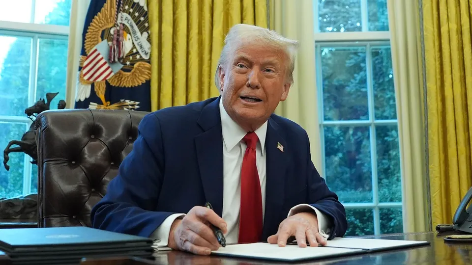 President Donald Trump speaks as he signs an executive order in the Oval Office of the White House on Monday, Feb. 3, 2025, in Washington.