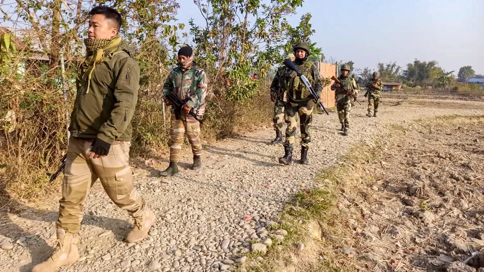 Security personnel during a search operation in the fringe and vulnerable areas of hill and valley districts of Manipur.