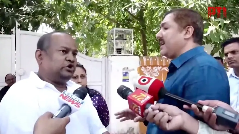 Bishnupada Sethi (left) argues with CBI officer on Tuesday, Feb 18, 2025.