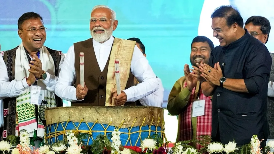 Narendra Modi with Himanta Biswa Sarma attends mega tribal dance event Jhumoir Binandini in Guwahati, Assam.