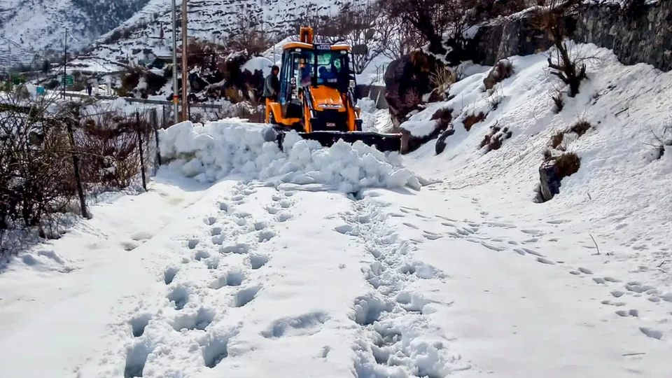 Army personnel shift injured people to a hospital in Joshimath as rescue work is underway after several labourers got trapped under snow following an avalanche in Mana area of Chamoli district on Sunday, March 2, 2025.