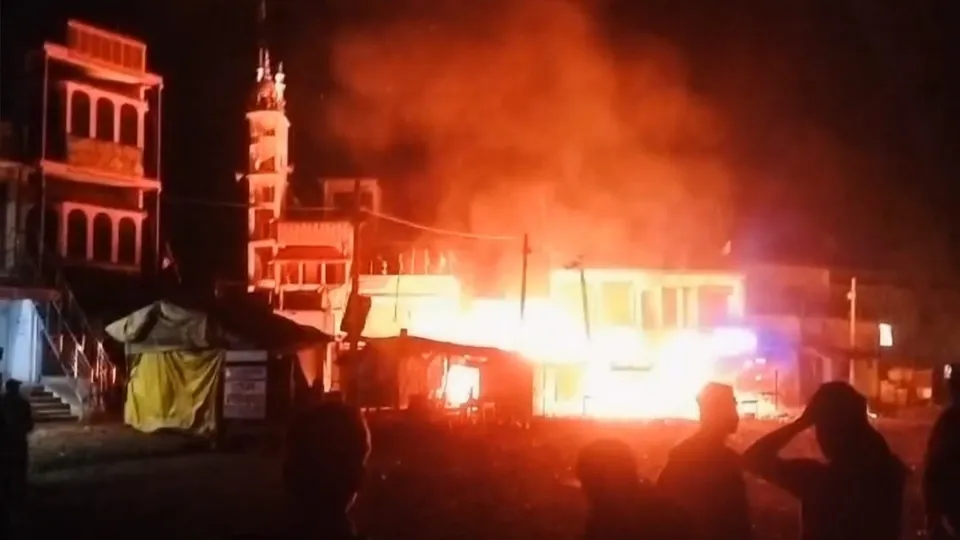 Smoke out after at least three shops were allegedly torched in a clash that broke out between two groups during a Holi procession in Jharkhand's Giridih district on Friday, March 14, 2025.