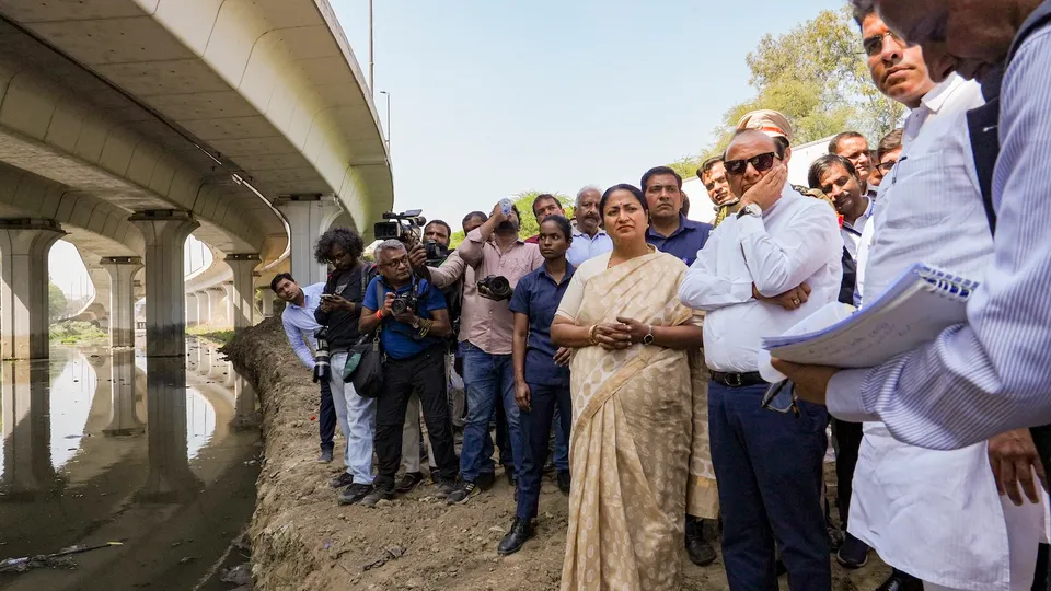 Delhi Lt. Governor Vinai Kumar Saxena, Chief Minister Rekha Gupta, Cabinet Minister Parvesh Verma during inspection of ongoing work at Sunheri Pul, Kushak and Barapulla drain in New Delhi on Sunday, March 16, 2025.